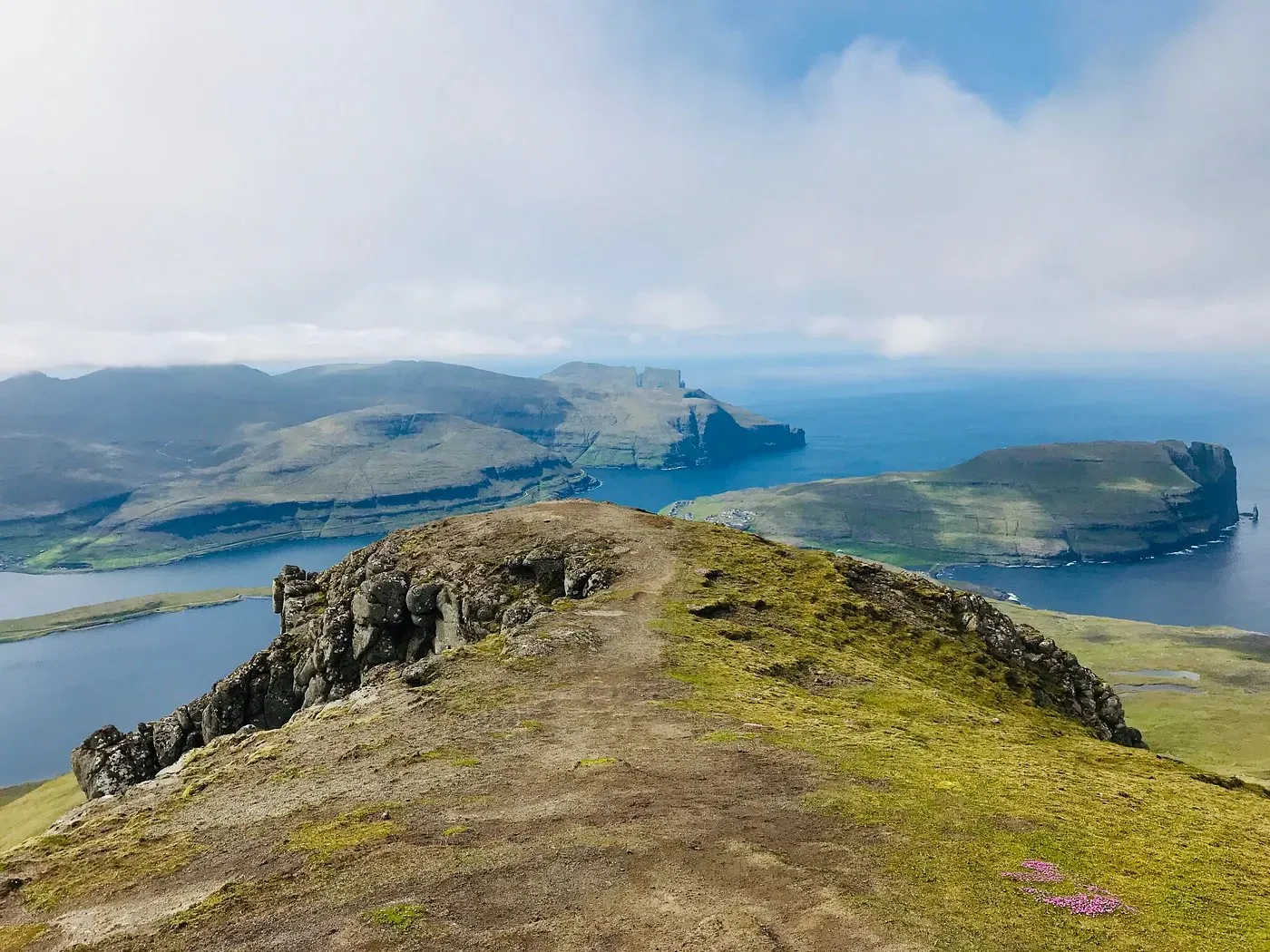 The summit ridge of Slaettaratindur with islands and sea beyond
