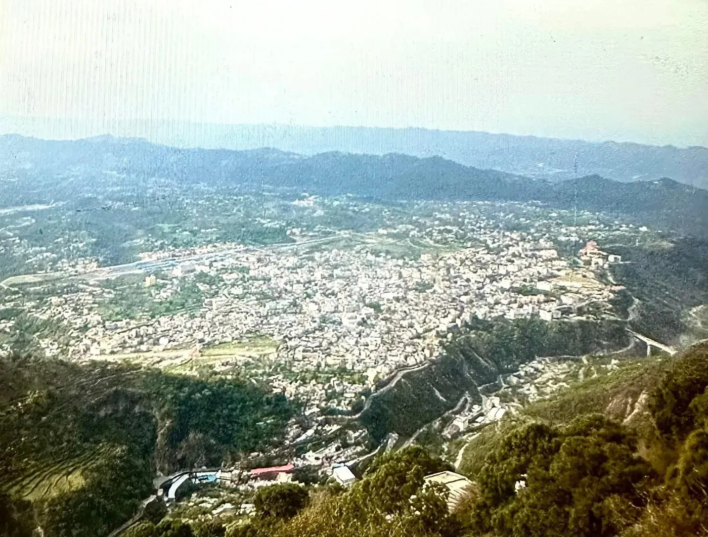 Looking down on the town of Katra spread across the valley